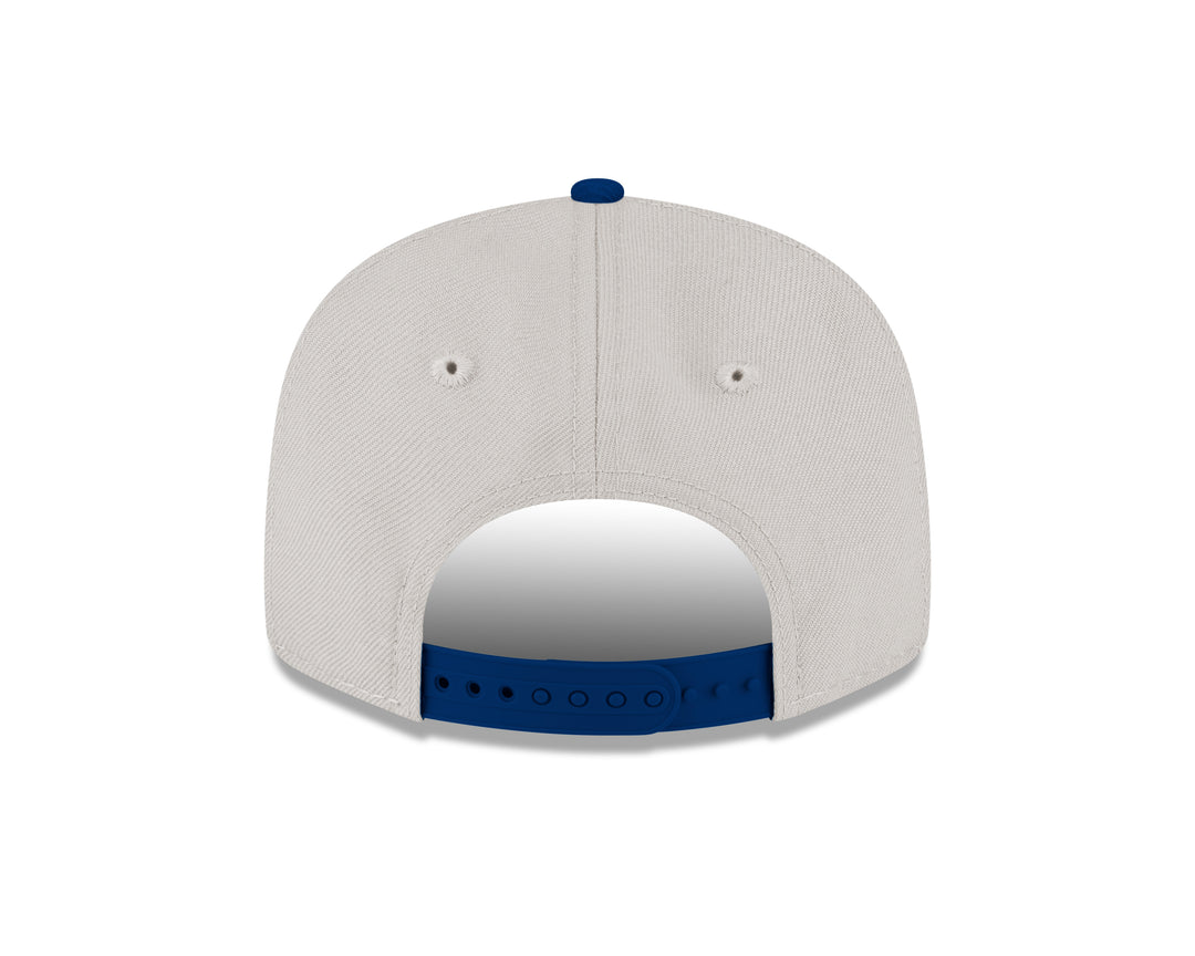 DALLAS MAVERICKS NEW ERA TWO TONED CREAM AND NAVY 950 SNAPBACK CAP