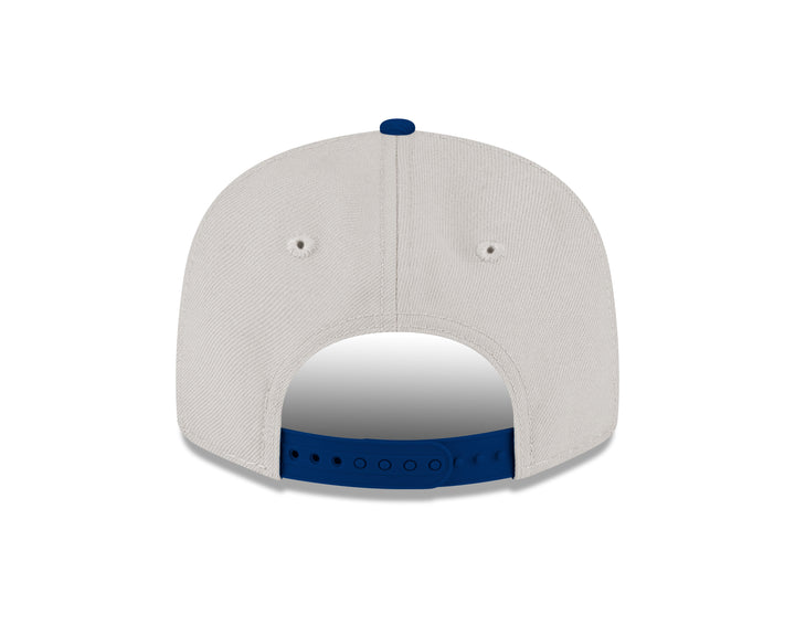 DALLAS MAVERICKS NEW ERA TWO TONED CREAM AND NAVY 950 SNAPBACK CAP